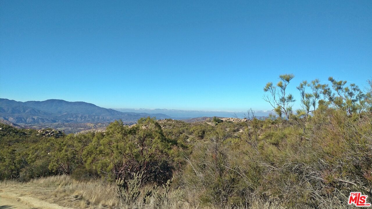 4 Sycamore Falls Road Aguanga, CA 92536 - Photo 39 of 67 a view of a city with a mountain in the background