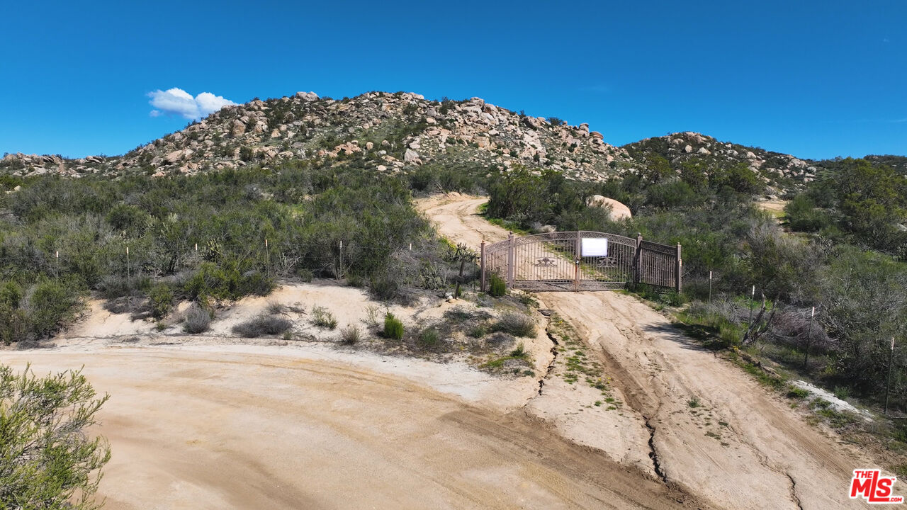 4 Sycamore Falls Road Aguanga, CA 92536 - Photo 4 of 67 a view of a road with a snow on the road