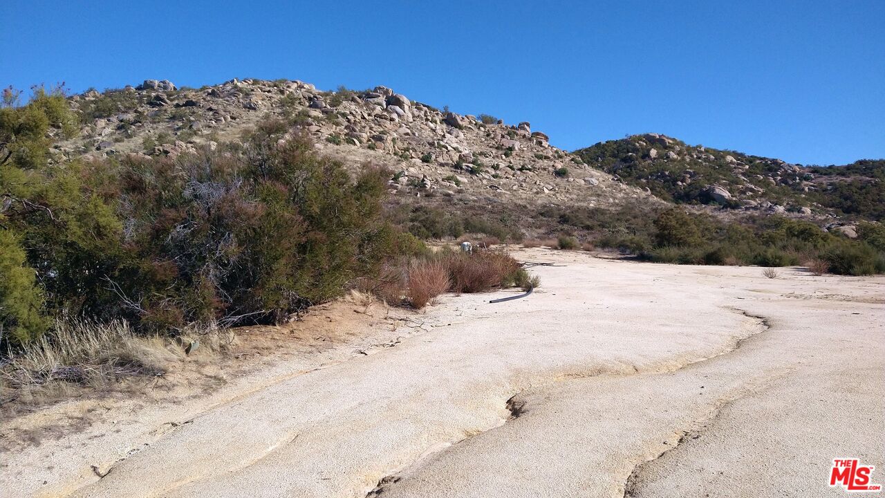 4 Sycamore Falls Road Aguanga, CA 92536 - Photo 47 of 67 a view of a dry yard covered with snow