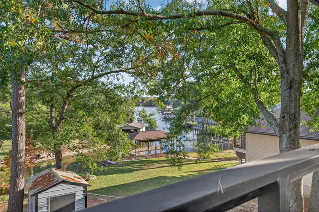 a view of bathroom with a sink mirror and