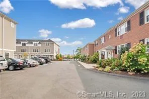 a view of a street with cars