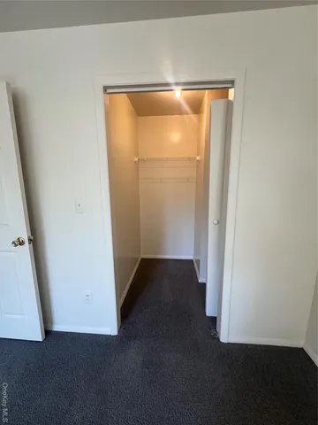 an empty room with a door