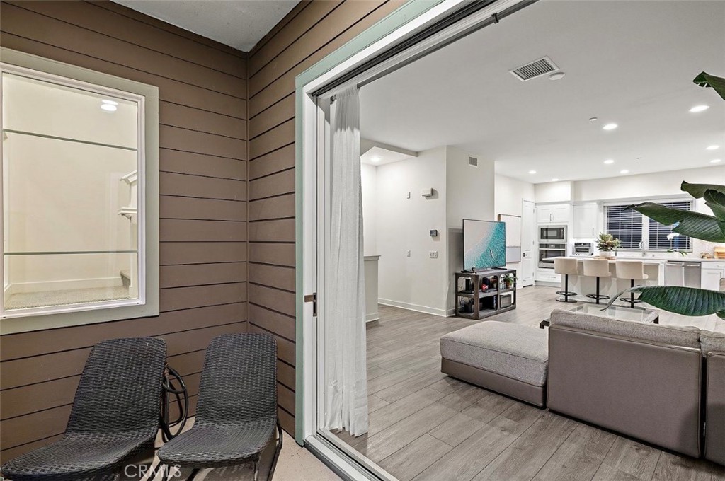 769 Doheny Way Dana Point, CA 92629 - Photo 18 of 35 a living room with furniture and a window