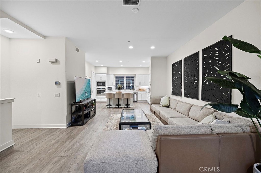 769 Doheny Way Dana Point, CA 92629 - Photo 7 of 35 a living room with furniture and a flat screen tv
