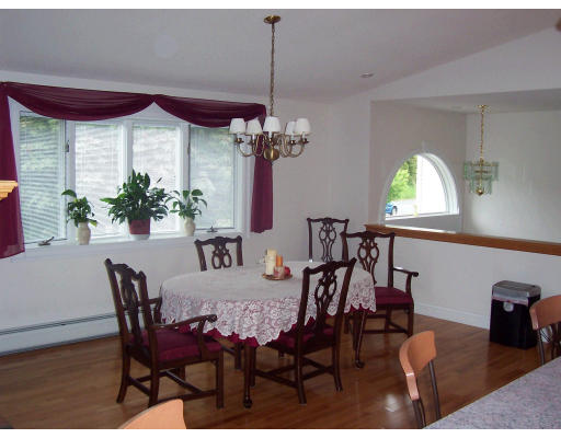 82 Country View Street West Springfield, MA 01089 - Photo 6 of 13 a view of a dining room with furniture and a chandelier