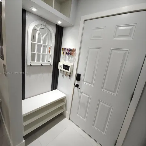 a bathroom with bathtub and shower