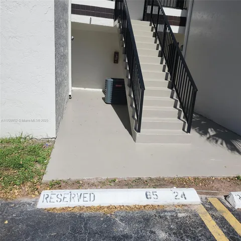 a view of a golf course with a lake