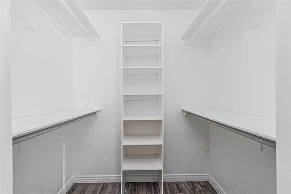 a view of an empty walk in closet