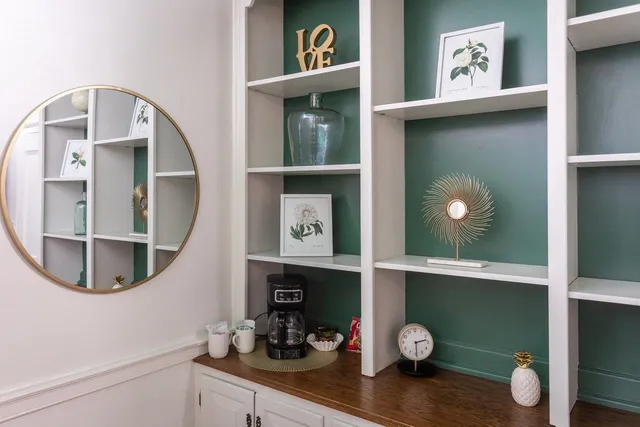 a living room with a fireplace