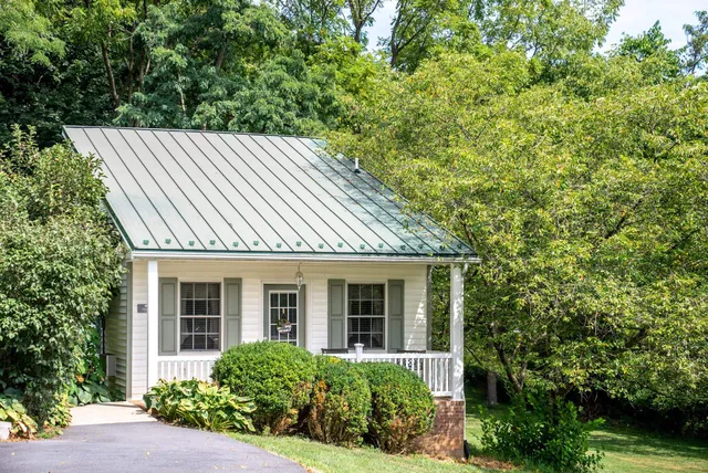 front view of a house with a garden