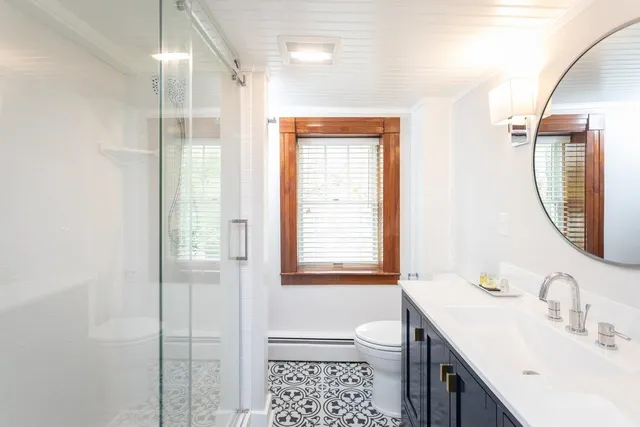 a view of a house with a yard from a balcony