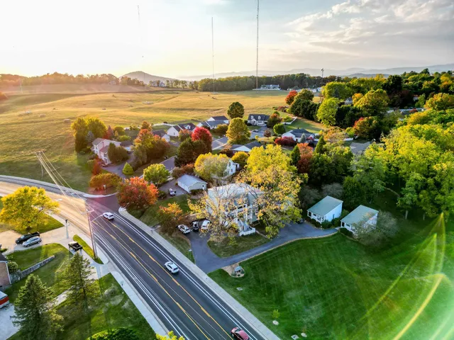 a kitchen with a sink cabinets and a window