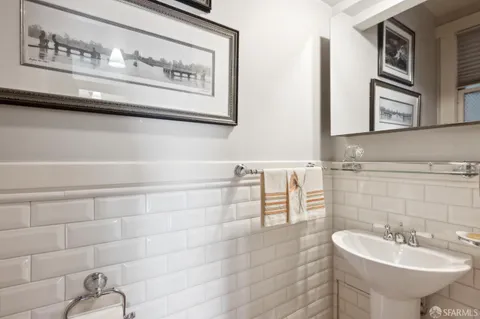 a view of a balcony with a tree