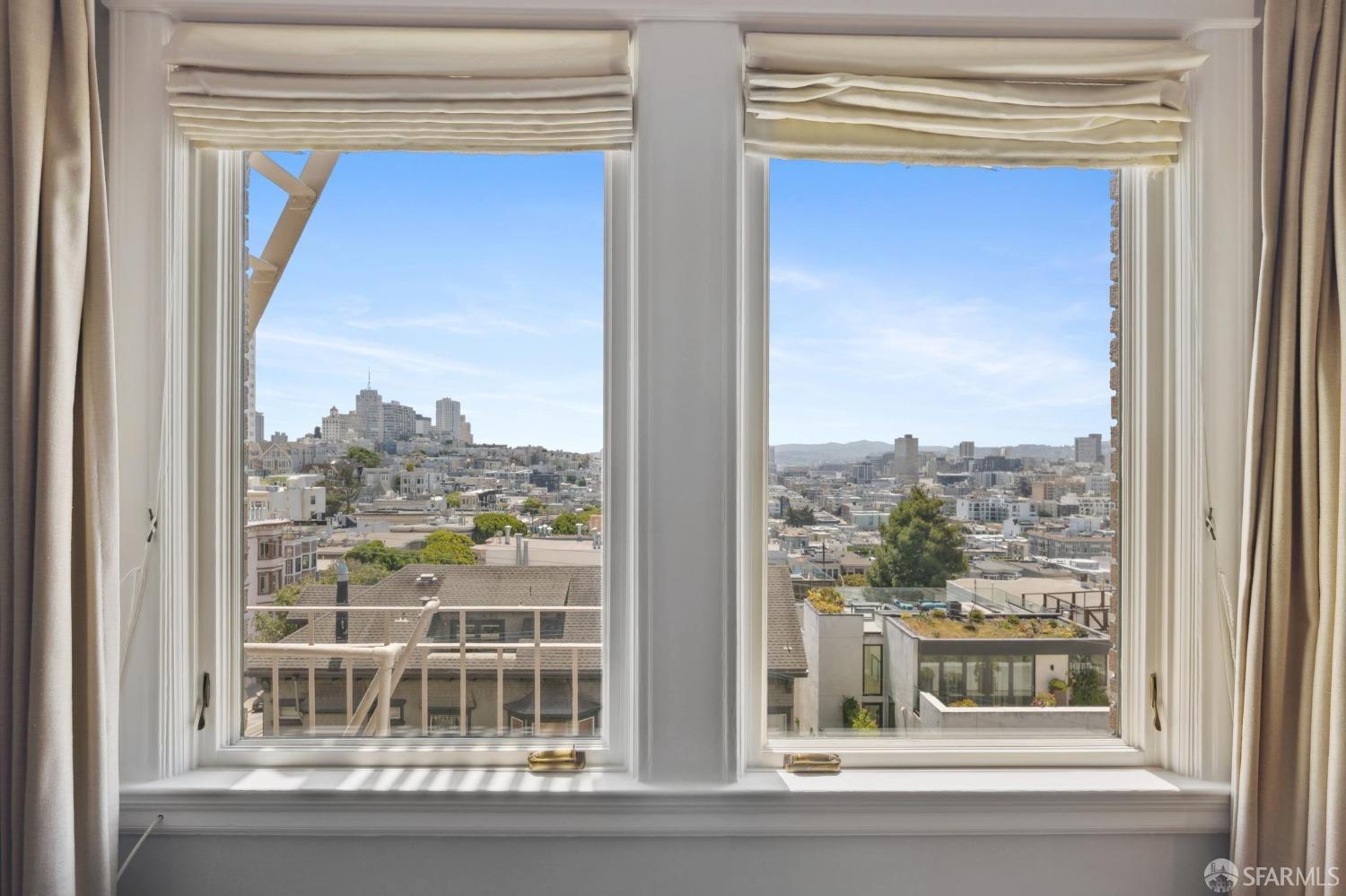 2111 Hyde Street, Unit 403 San Francisco, CA 94109 - Photo 37 of 60 a view of a glass door and a window