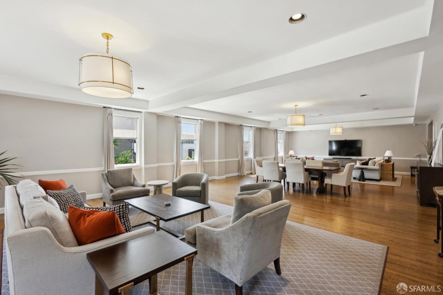 2111 Hyde Street, Unit 403 San Francisco, CA 94109 - Photo 55 of 60 a living room with furniture a window and kitchen view