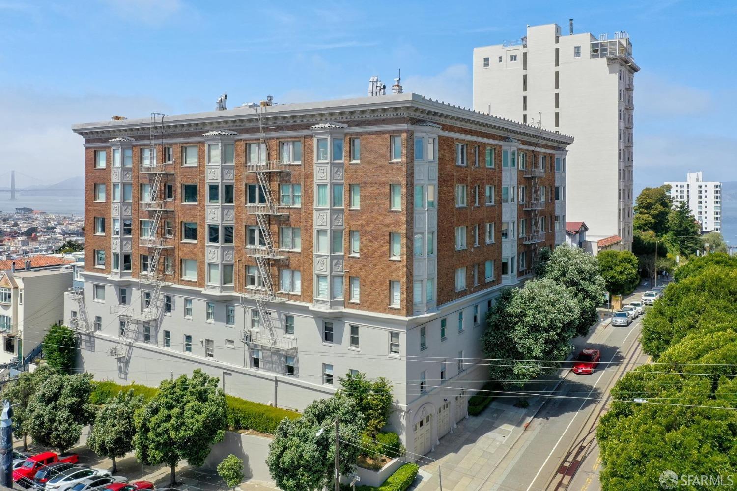 2111 Hyde Street, Unit 403 San Francisco, CA 94109 - Photo 59 of 60 a view of a building yard and potted plants