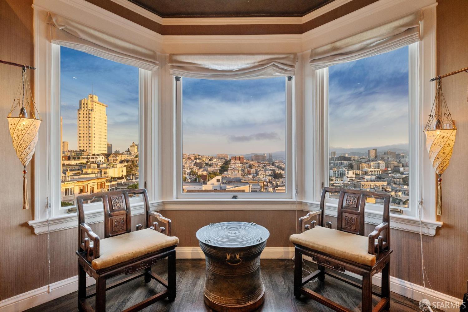 2111 Hyde Street, Unit 403 San Francisco, CA 94109 - Photo 6 of 60 a living room with furniture and a large window