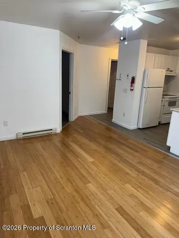 a view of a livingroom with a furniture