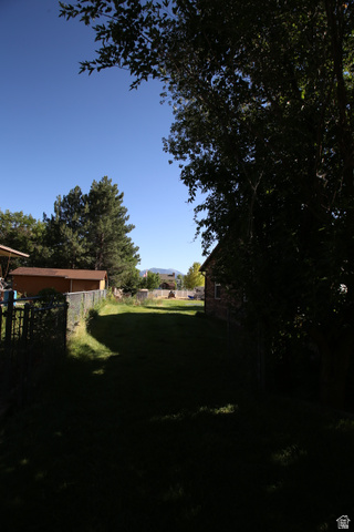 1612 East 450 South Springville, UT 84663 - Photo 3 of 48 Expansive grassy yard with mature trees