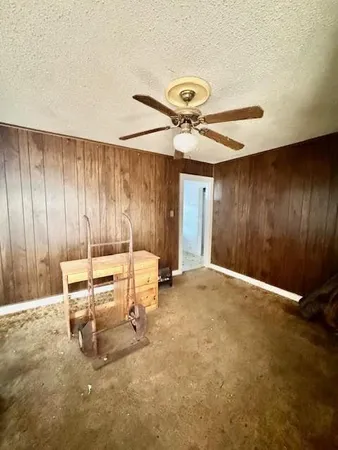 a kitchen with stainless steel appliances a refrigerator a sink a stove a microwave and cabinets