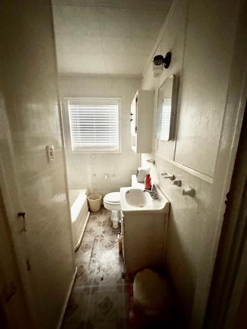 1601 Peterson Road South Iowa Park, TX 76367 - Photo 6 of 13 a bathroom with a sink toilet and mirror