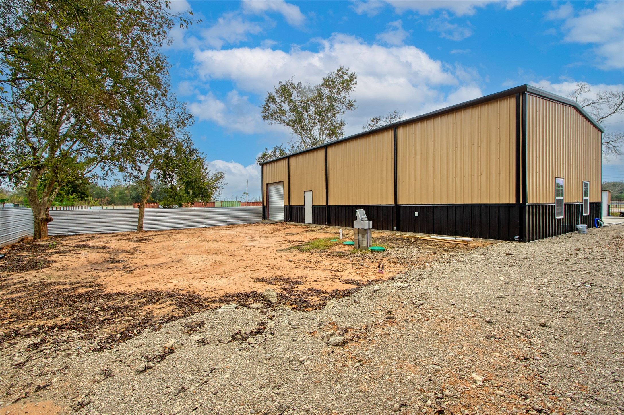 13051 Pleasant Valley Drive Rosharon, TX 77583 - Photo 17 of 20 a view of a house with a yard