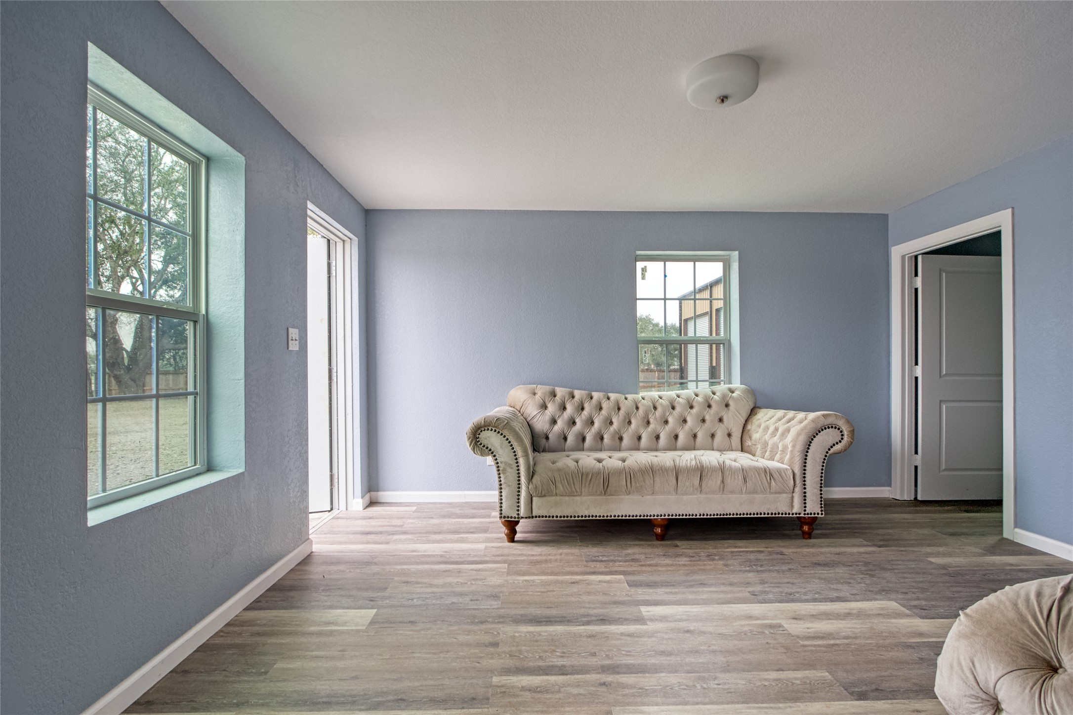 13051 Pleasant Valley Drive Rosharon, TX 77583 - Photo 9 of 20 a living room with furniture and a window