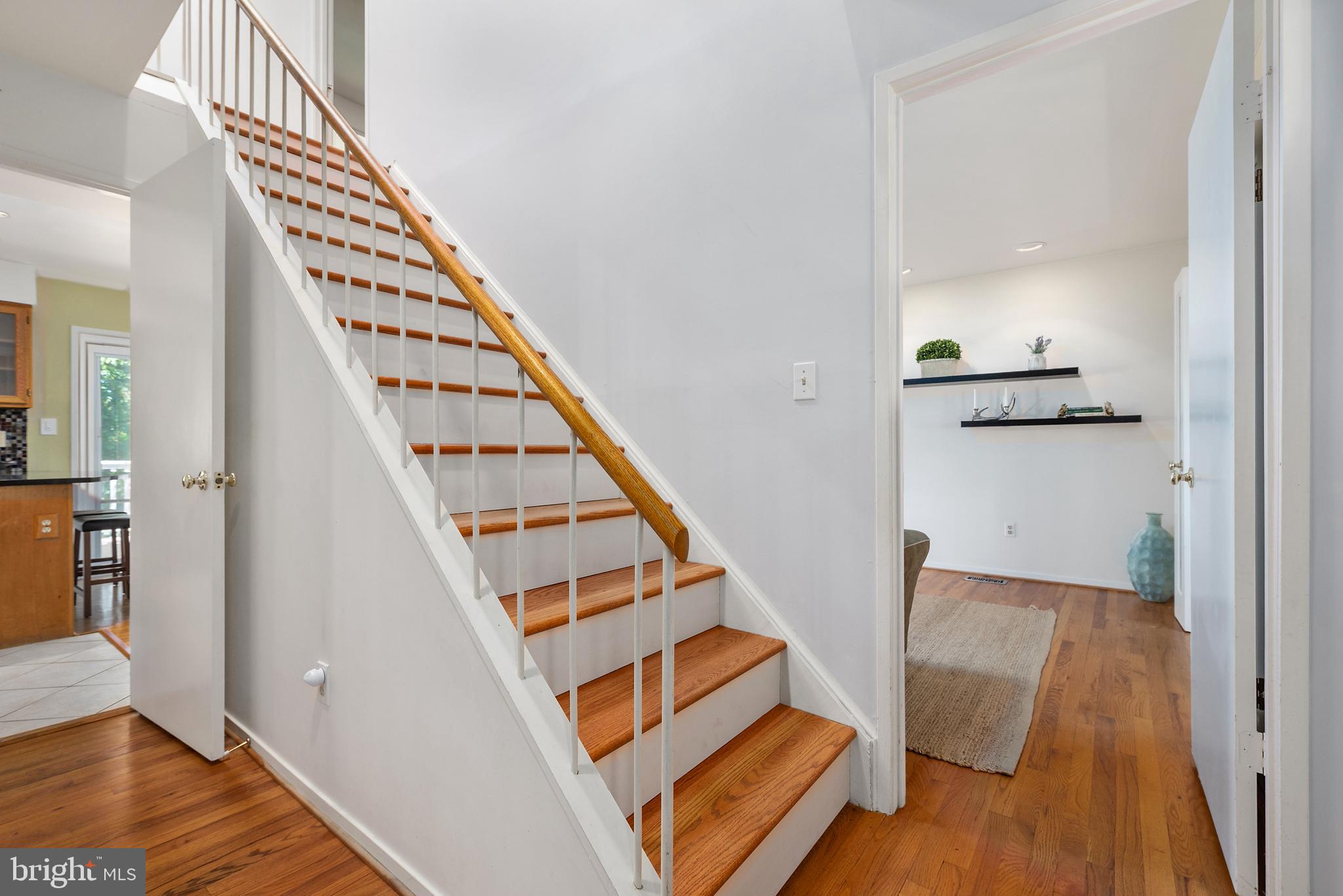 1522 Ainsley Road Silver Spring, MD 20904 - Photo 18 of 46 Hardwood Stairs and throughout 1st level