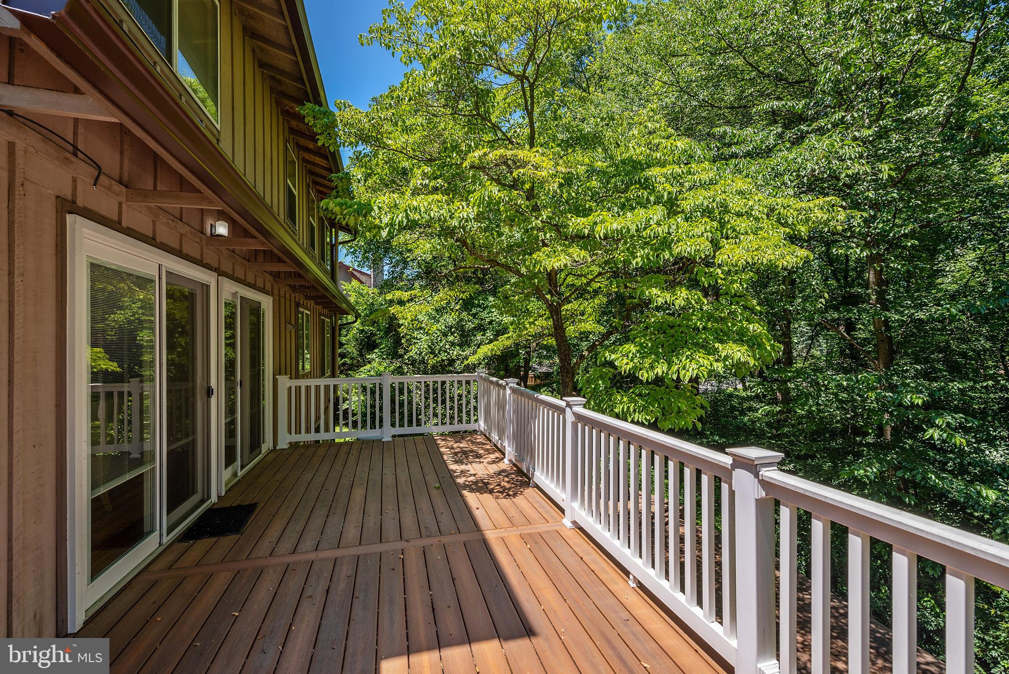 1522 Ainsley Road Silver Spring, MD 20904 - Photo 35 of 46 Expansive Trex Deck with Stairs to Patio area