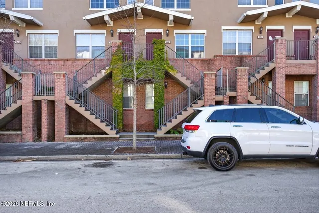 a car parked in front of a building