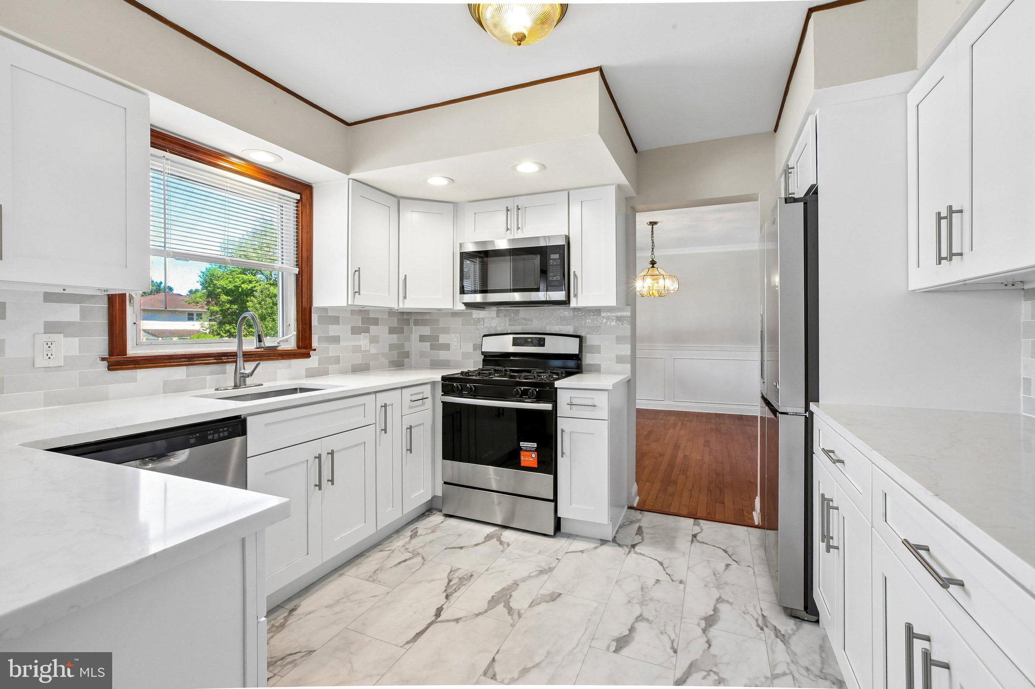 56 Whitehall Road Hamilton, NJ 08690 - Photo 13 of 37 Modern kitchen with sleek finishes.