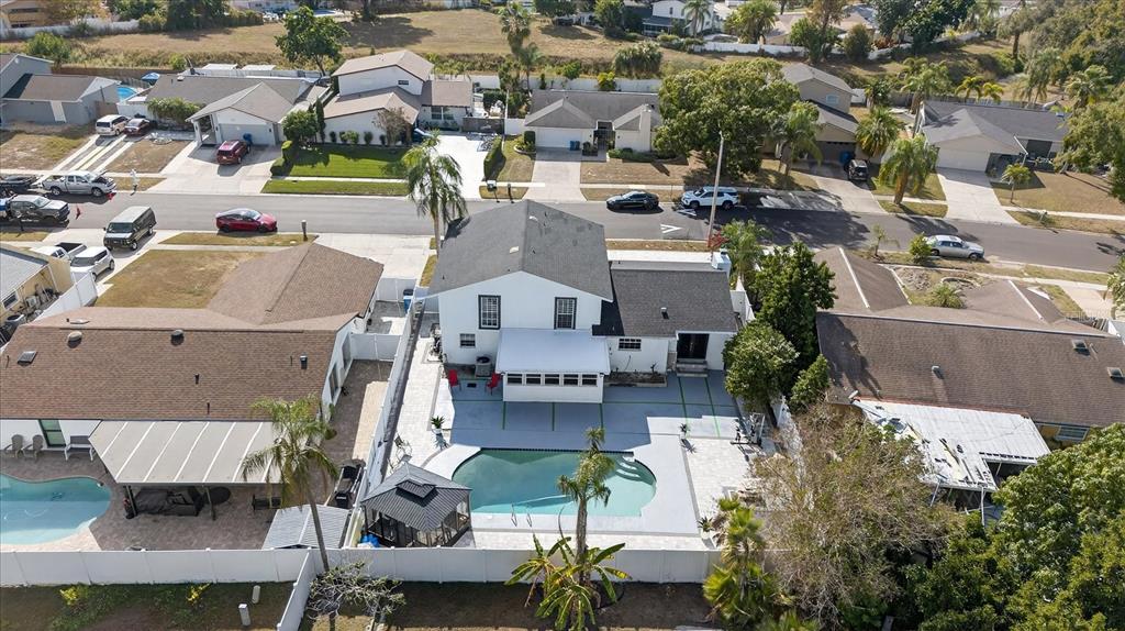 7613 Rustic Drive Tampa, FL 33634 - Photo 4 of 68 an aerial view of residential houses with outdoor space