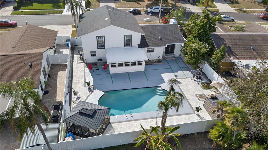 7613 Rustic Drive Tampa, FL 33634 - Photo 5 of 68 an aerial view of a house with a garden