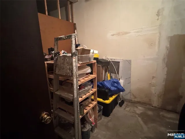 a bathroom with a toilet a sink and a mirror