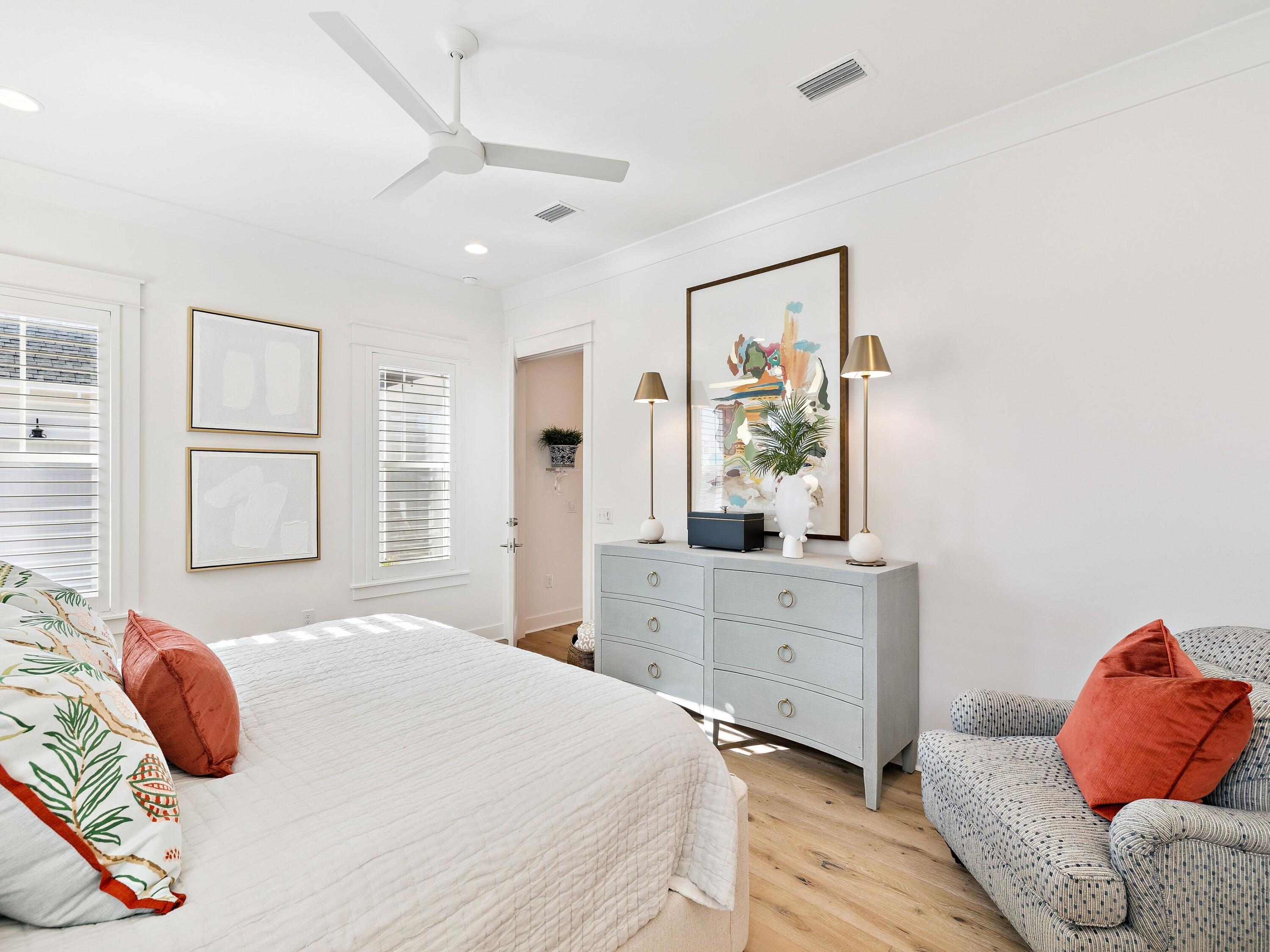 39 West Firethorn Circle Watersound, FL 32461 - Photo 21 of 33 a bedroom with a bed and window