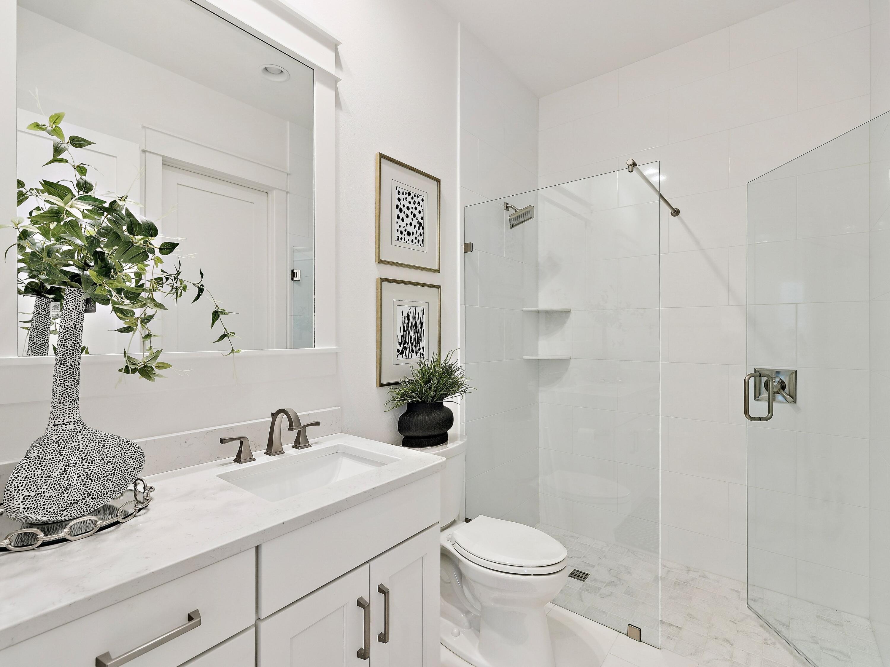 39 West Firethorn Circle Watersound, FL 32461 - Photo 8 of 33 a bathroom with a sink a toilet and shower