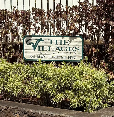 a sign that is on the side of the road