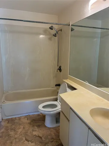 a bathroom with a sink a toilet and a bathtub