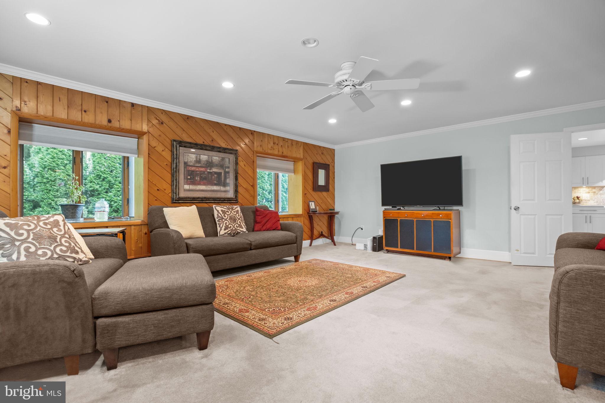 1708 Madeira Avenue Jenkintown, PA 19046 - Photo 11 of 63 a living room with furniture and a flat screen tv