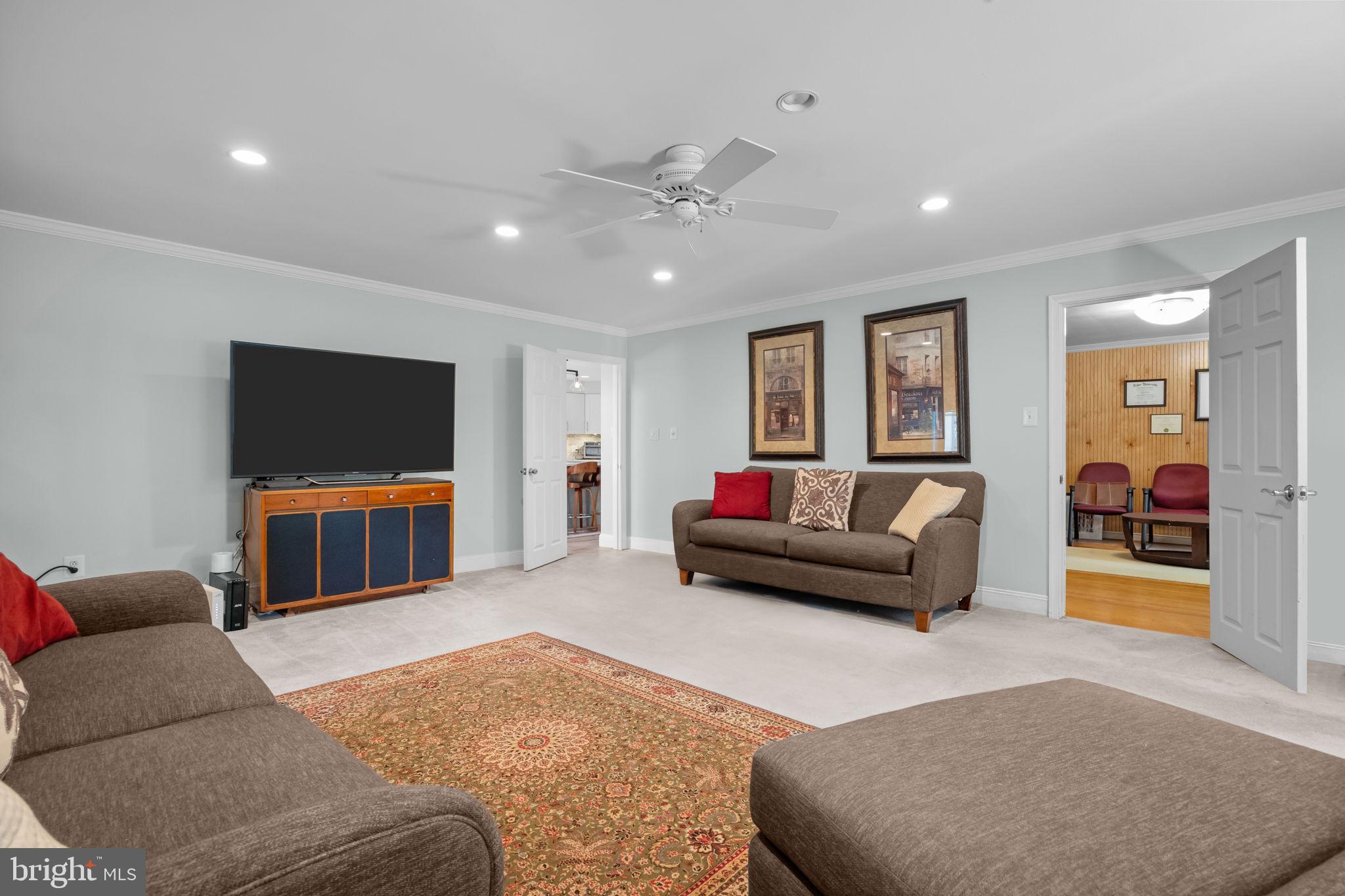 1708 Madeira Avenue Jenkintown, PA 19046 - Photo 12 of 63 a living room with furniture and a flat screen tv