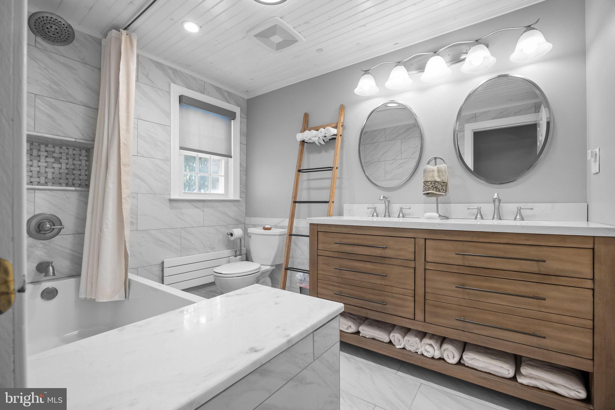 1708 Madeira Avenue Jenkintown, PA 19046 - Photo 33 of 63 a bathroom with a double vanity sink mirror and