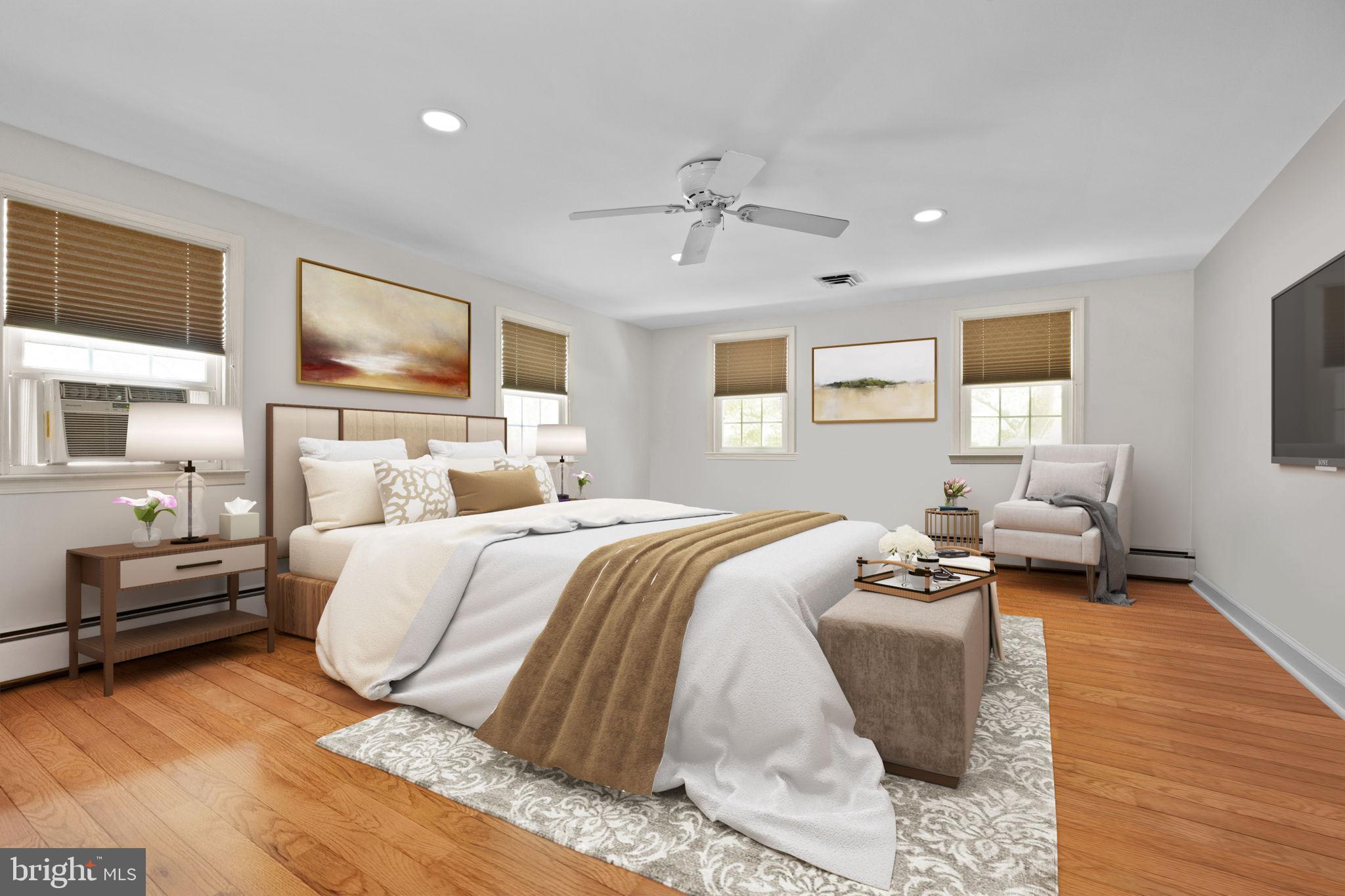 1708 Madeira Avenue Jenkintown, PA 19046 - Photo 37 of 63 a bedroom with a bed and wooden floor