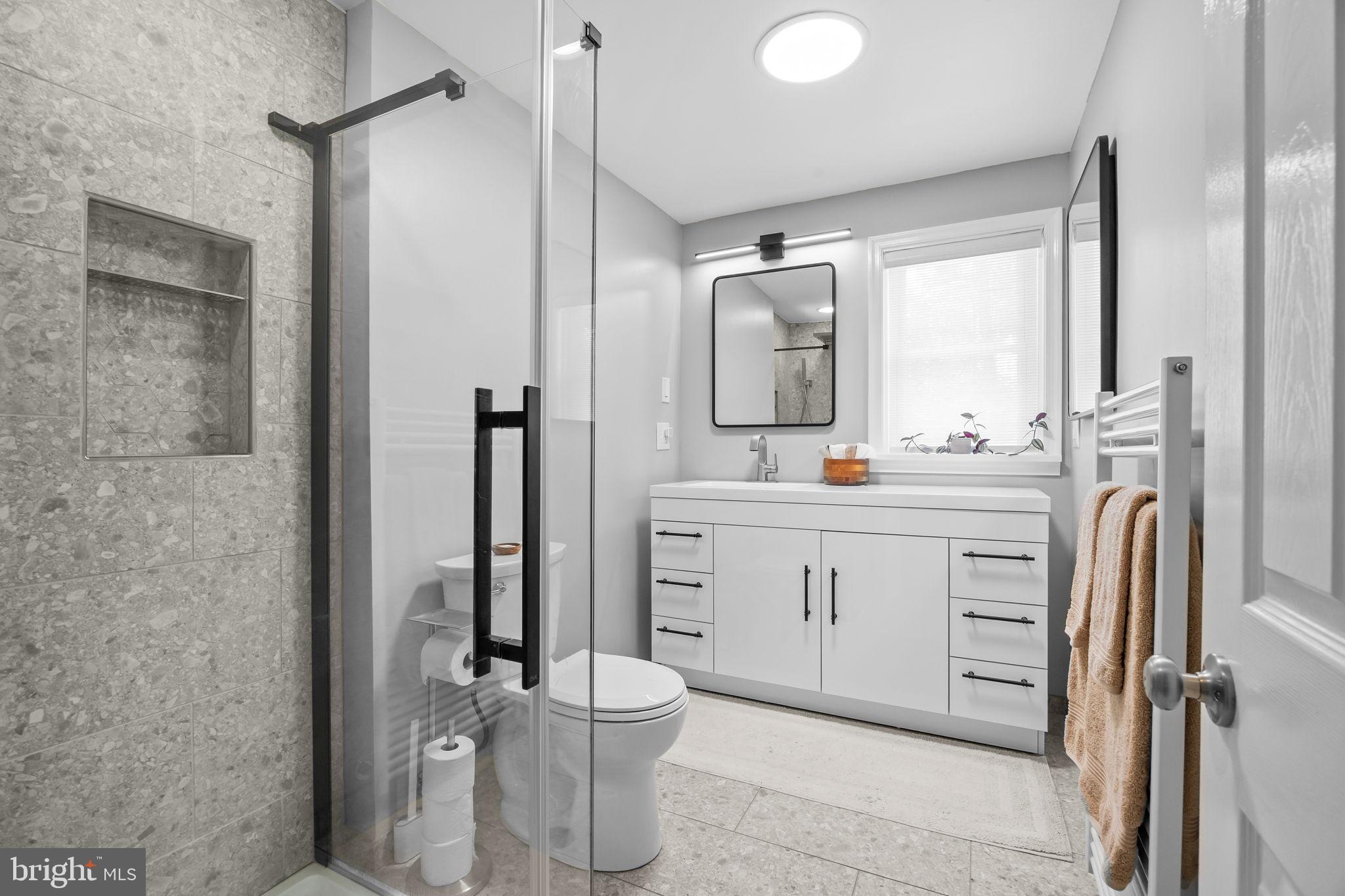 1708 Madeira Avenue Jenkintown, PA 19046 - Photo 39 of 63 a bathroom with a sink a toilet and shower