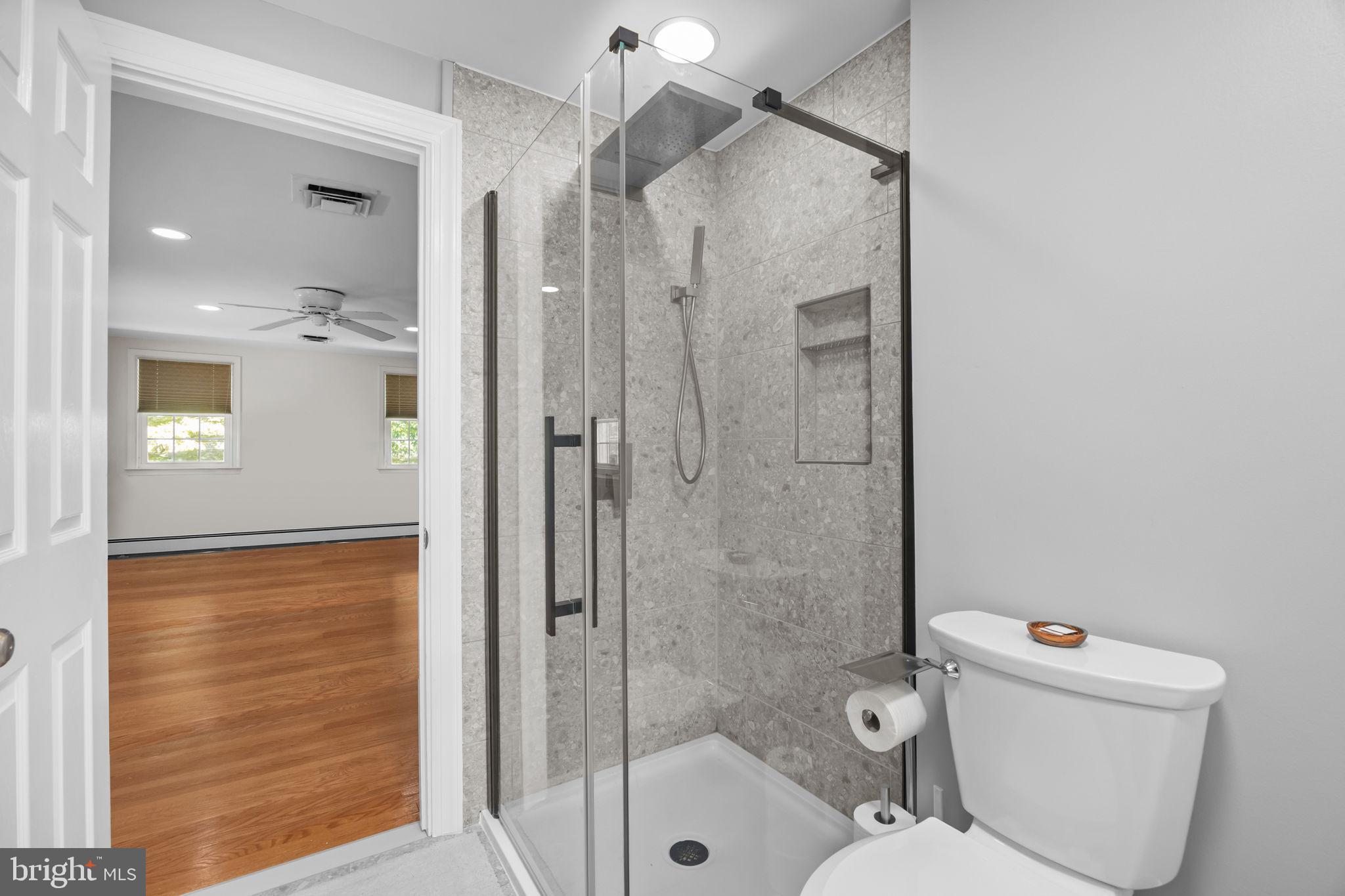 1708 Madeira Avenue Jenkintown, PA 19046 - Photo 41 of 63 a bathroom with a shower a toilet and a sink