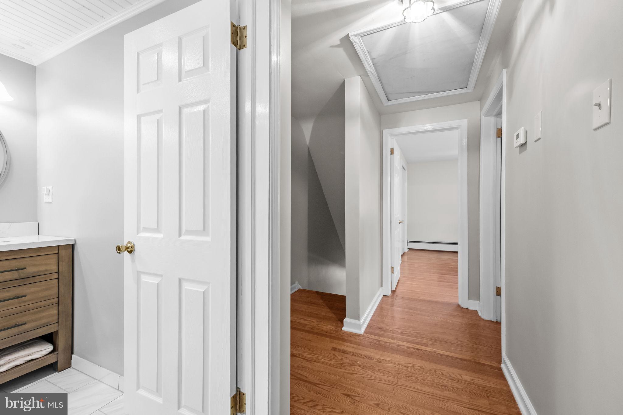 1708 Madeira Avenue Jenkintown, PA 19046 - Photo 42 of 63 a view of a hallway with wooden floor