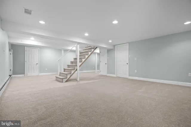 a view of a chairs and table on the wooden floor