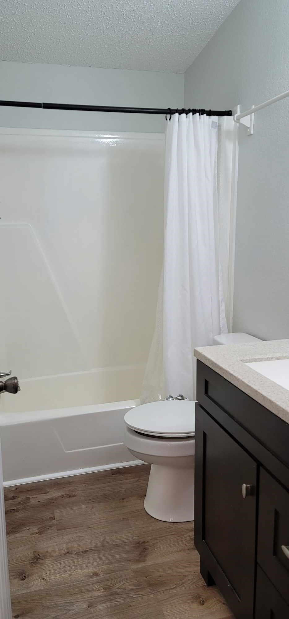 7772 Highway 1, Unit A St. Augustine, FL 32086 - Photo 13 of 14 a bathroom with a sink a toilet and a bathtub