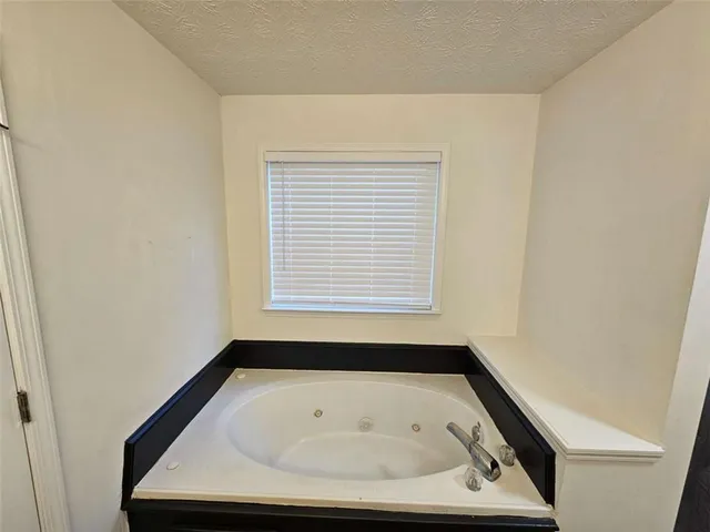 a bathroom with a bathtub