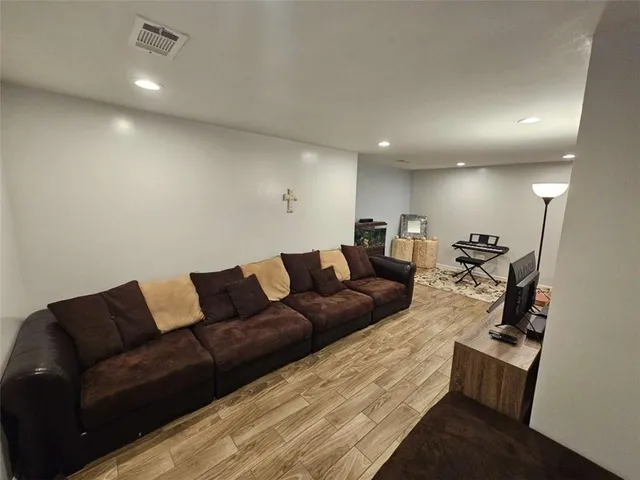 a living room with furniture and a couch
