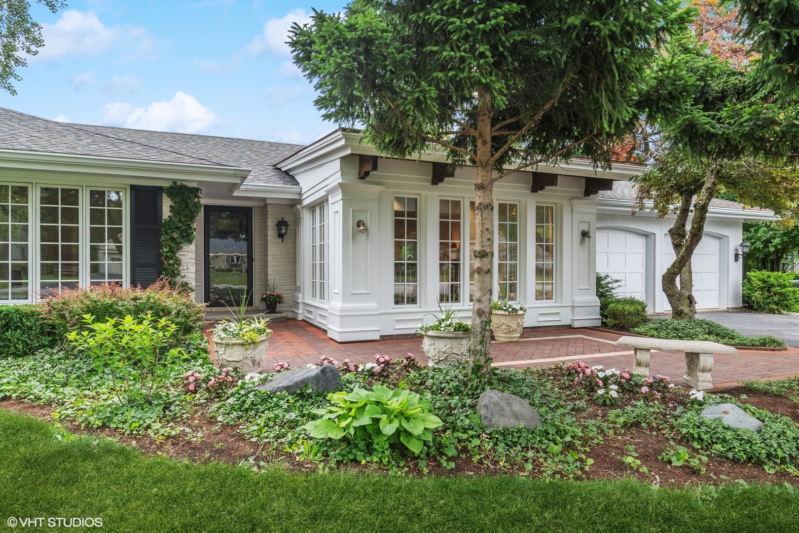 1224 Ridgewood Drive Northbrook, IL 60062 - Photo 2 of 34 front view of a house with a yard
